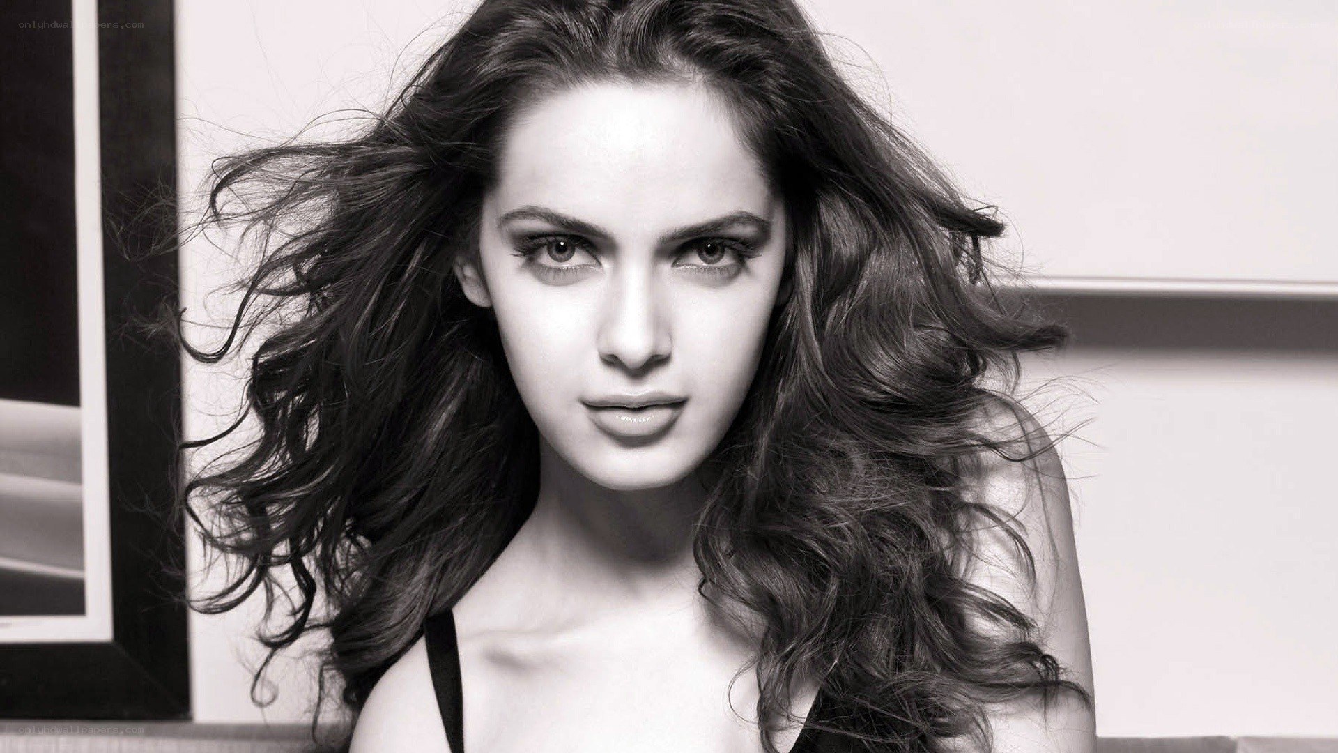 woman with long hair in black and white