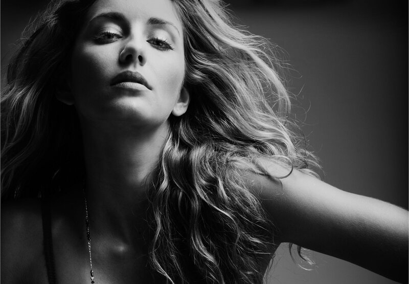 woman with long hair in black and white