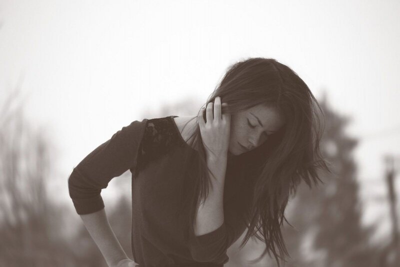 woman with long hair in black and white
