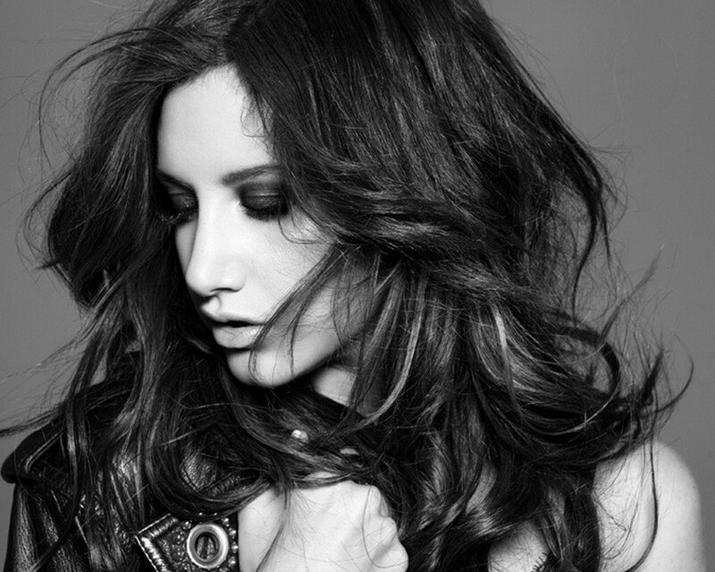 woman with long hair in black and white
