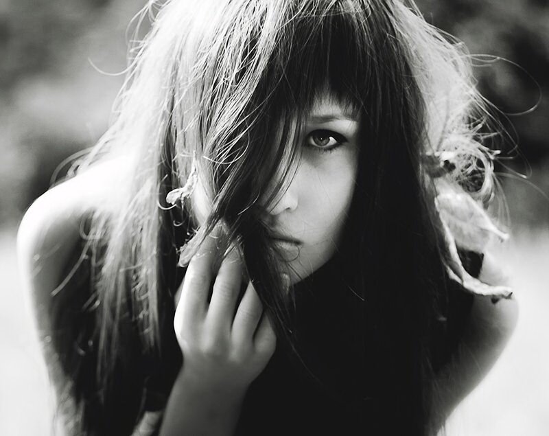 woman with long hair in black and white
