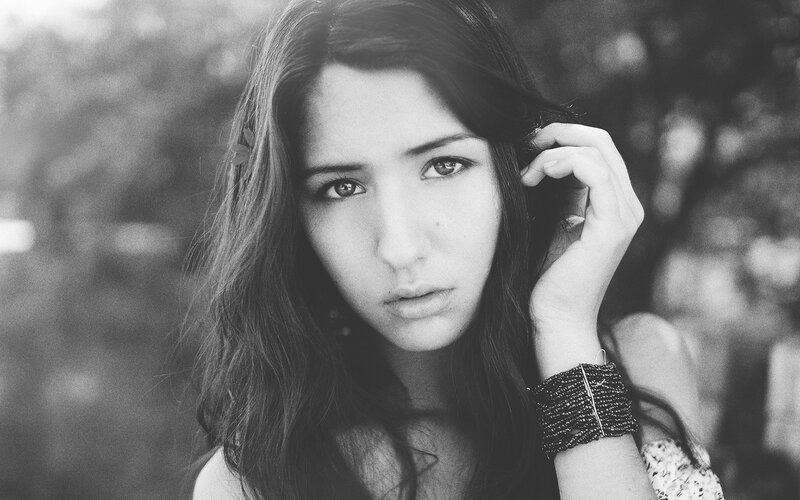 woman with long hair in black and white