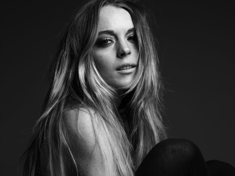 woman with long hair in black and white