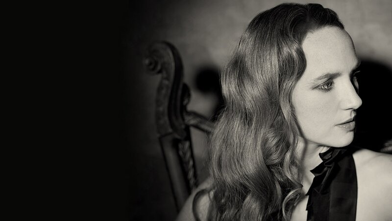 woman with long hair in black and white