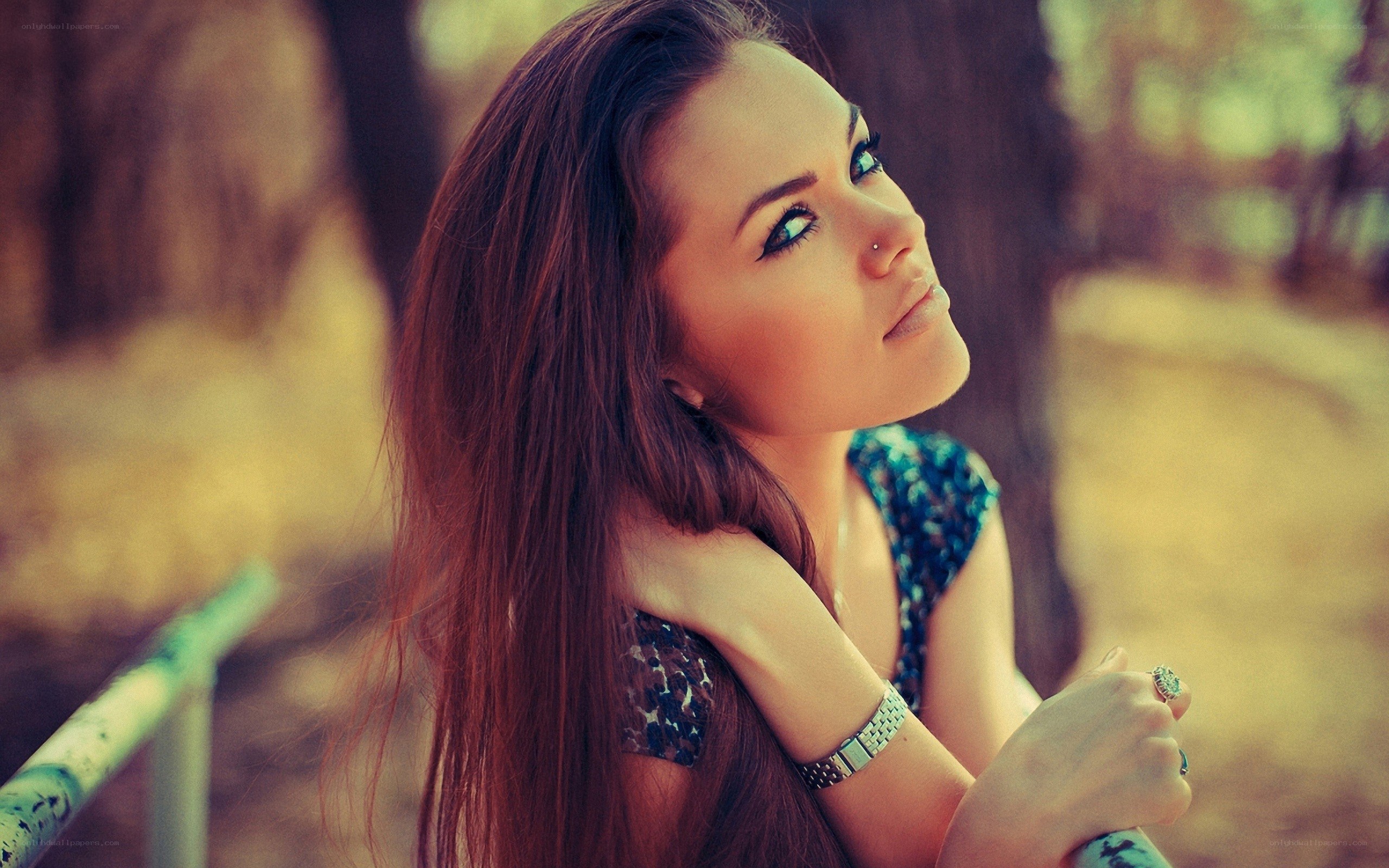 woman with long hair in park