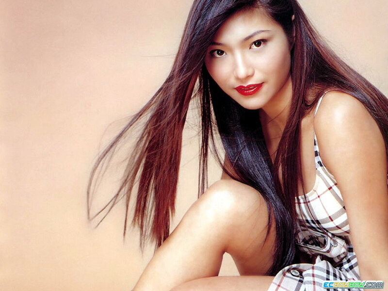 woman with long hair in plaid dress