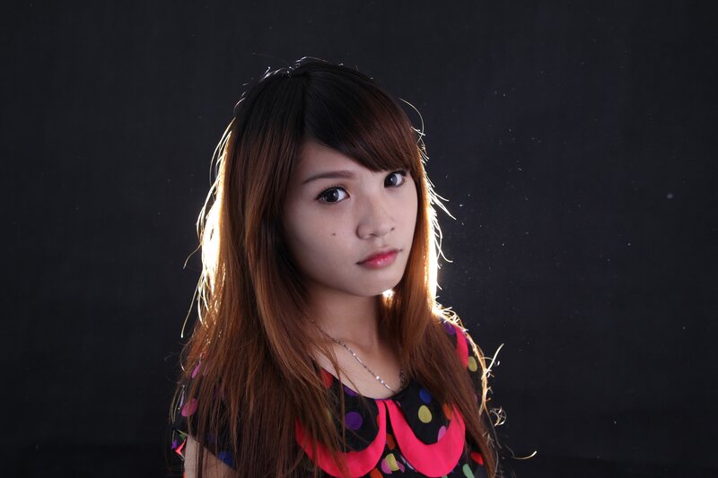 woman with long hair in studio