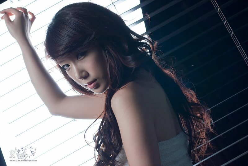 woman with long hair in studio