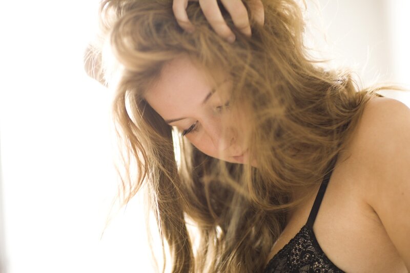 woman with long hair in sunlight