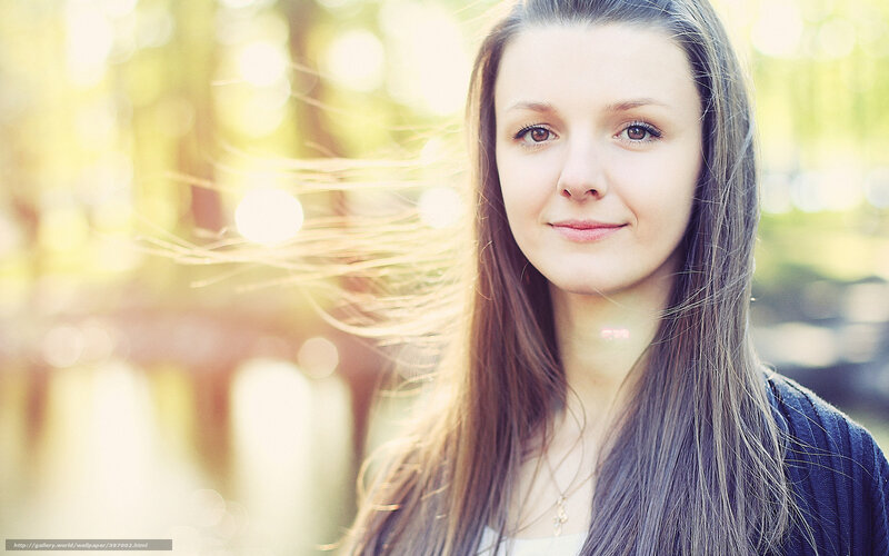 woman with long hair in sunlight