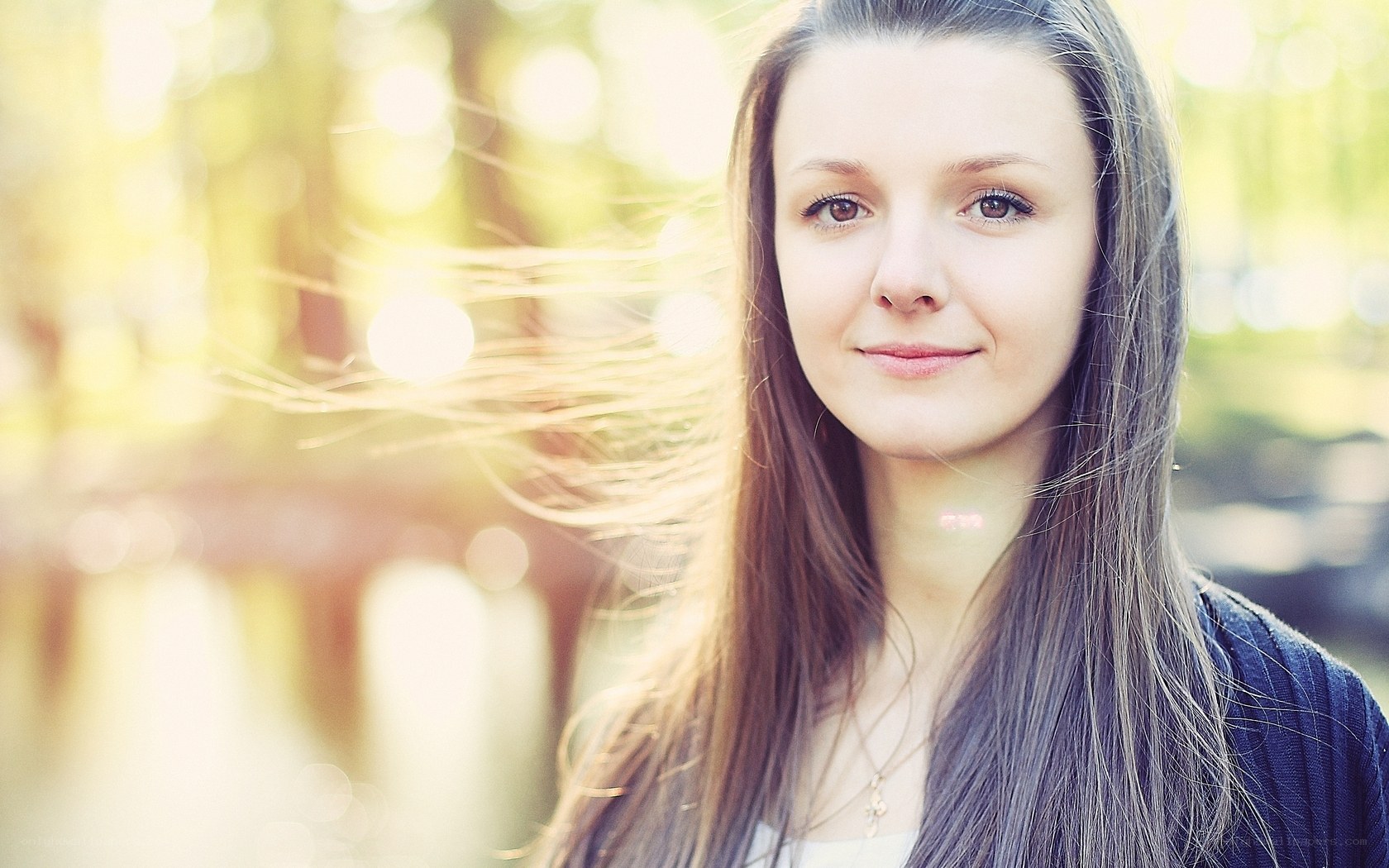 woman with long hair in sunlight