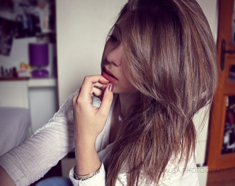 woman with long hair in thought