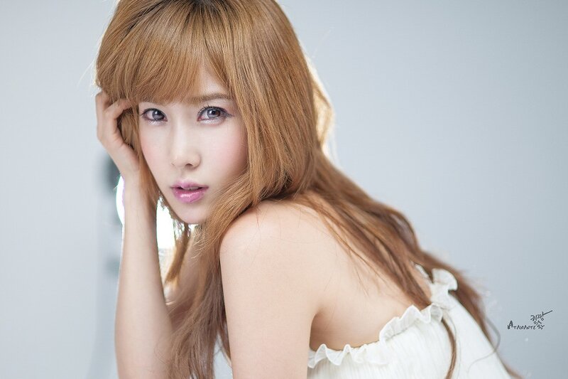 woman with long hair in white dress