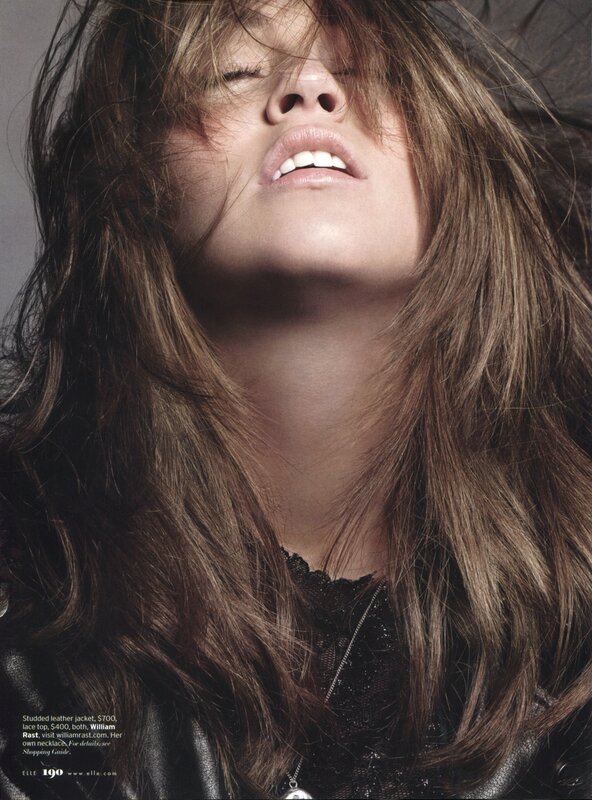woman with long hair looking up