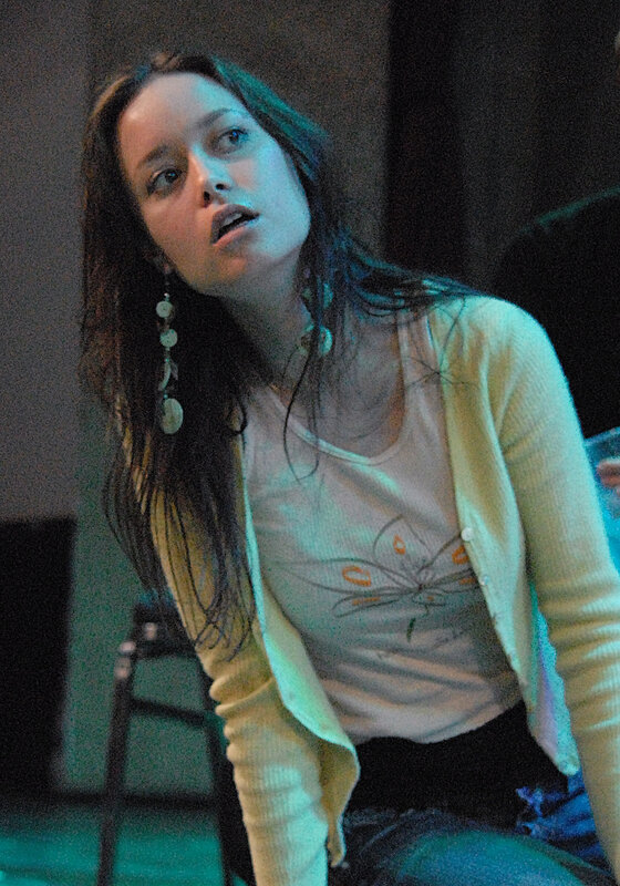 woman with long hair looking up