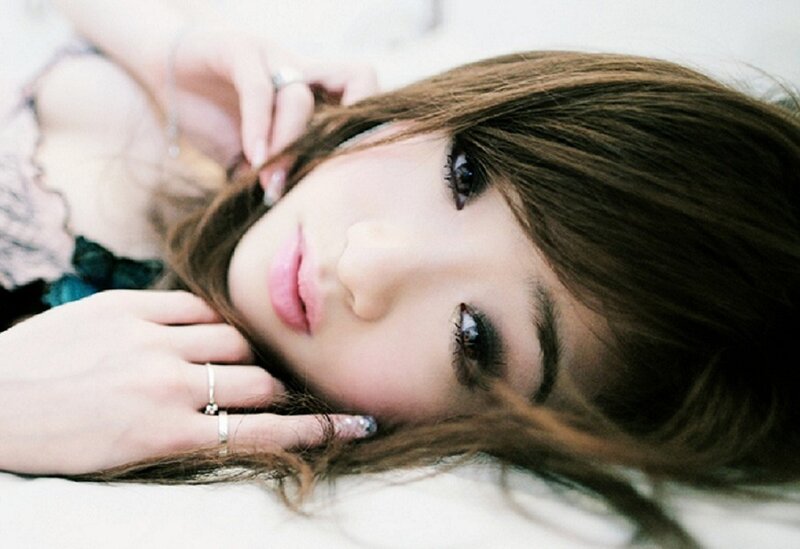 woman with long hair lying down