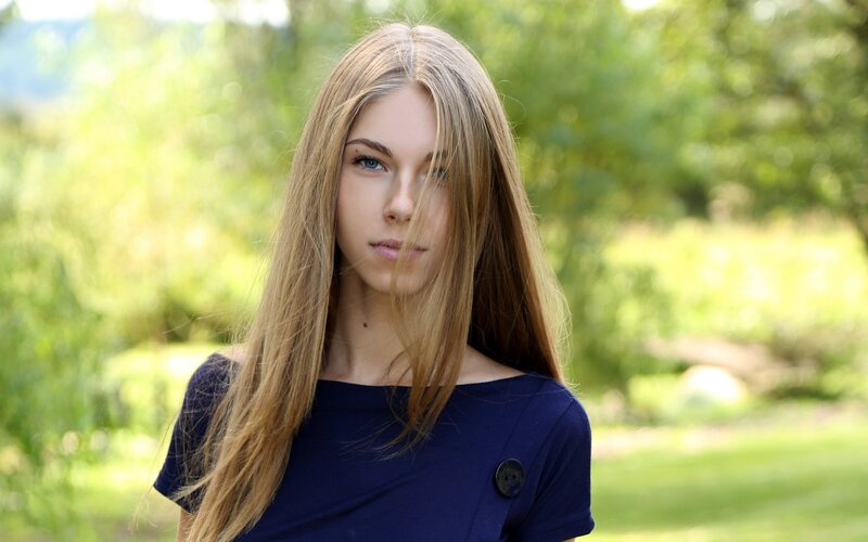 woman with long hair outdoors