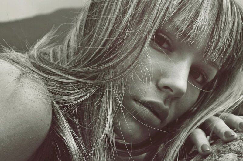 woman with long hair resting