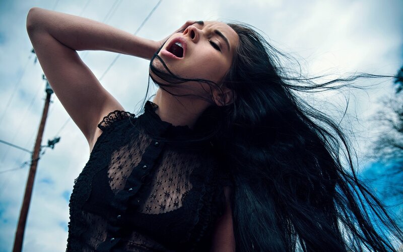 woman with long hair screaming