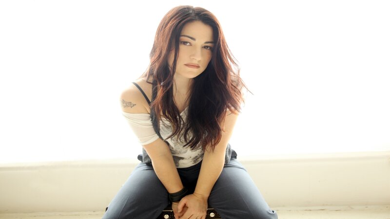 woman with long hair sitting
