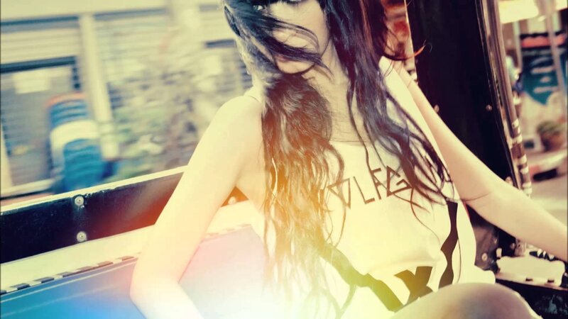 woman with long hair sitting