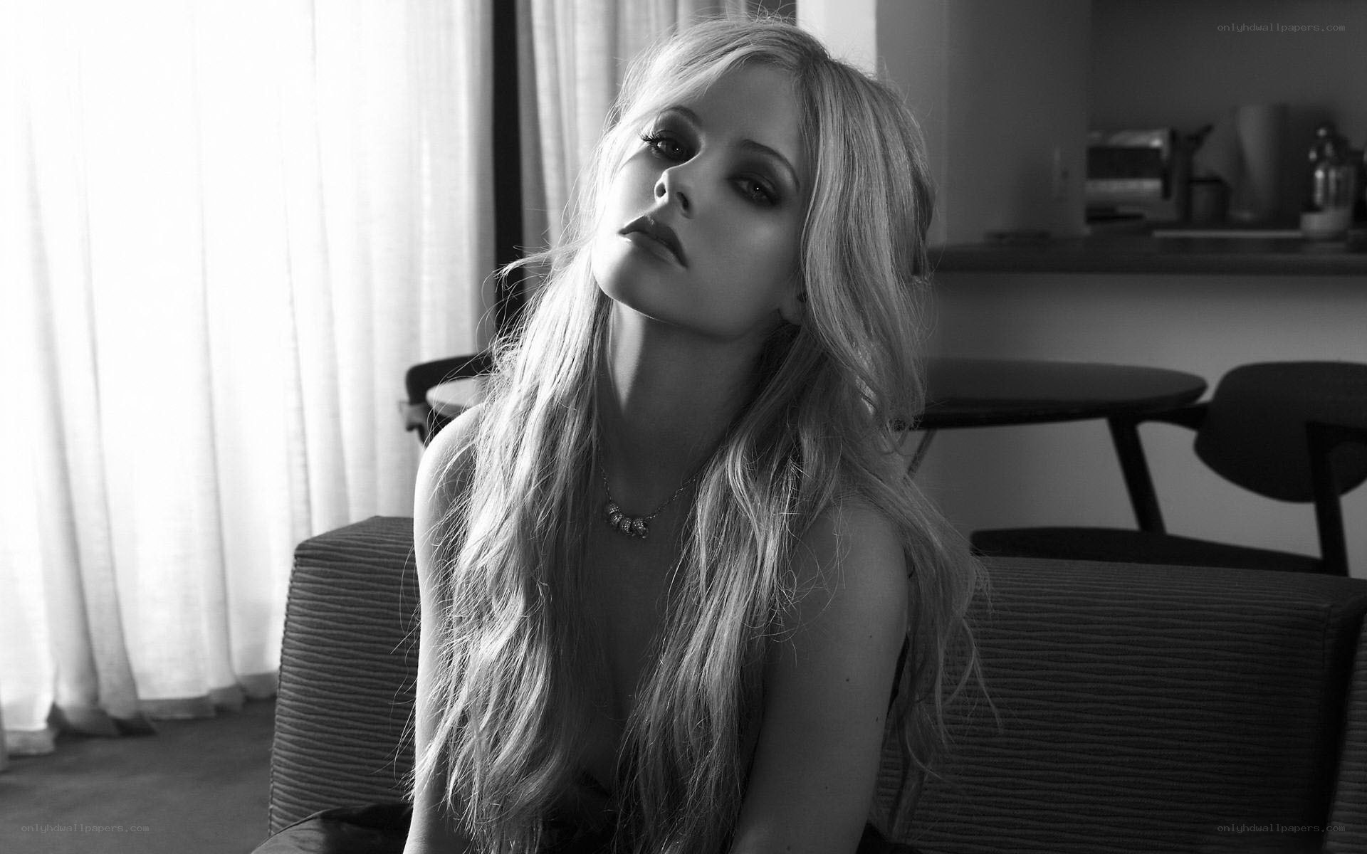 woman with long hair sitting