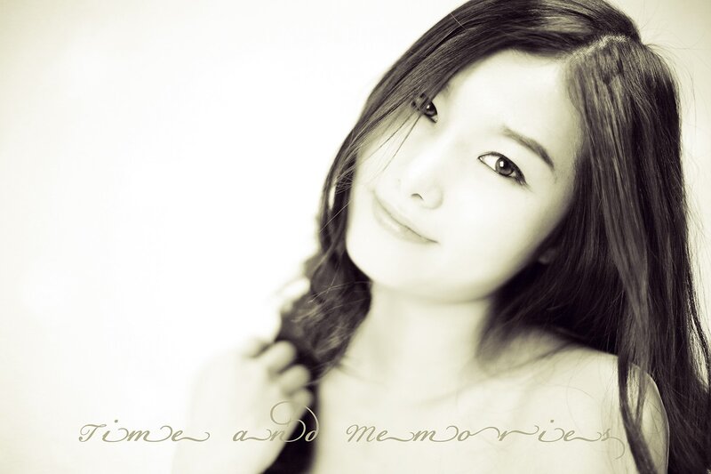 woman with long hair smiling