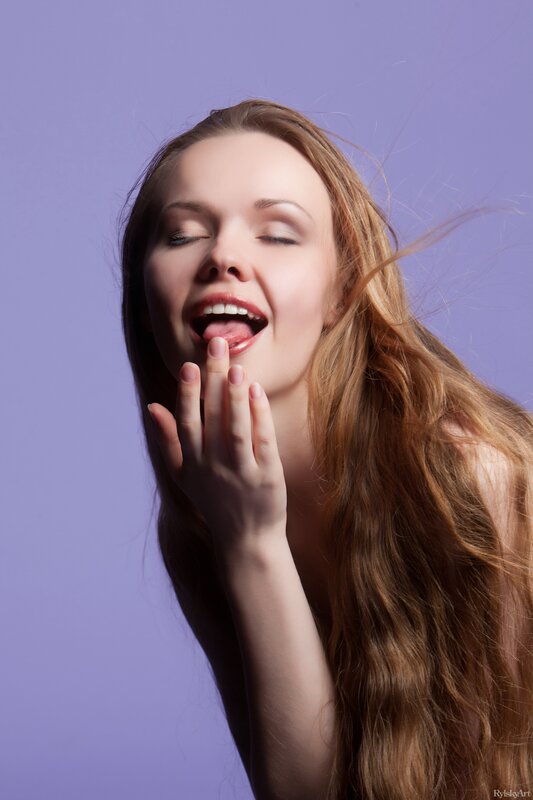woman with long hair smiling