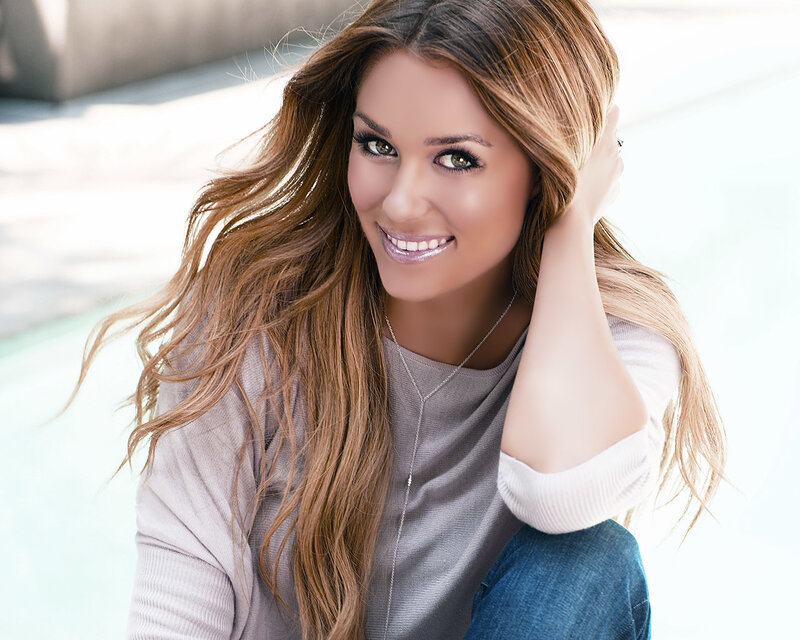 woman with long hair smiling