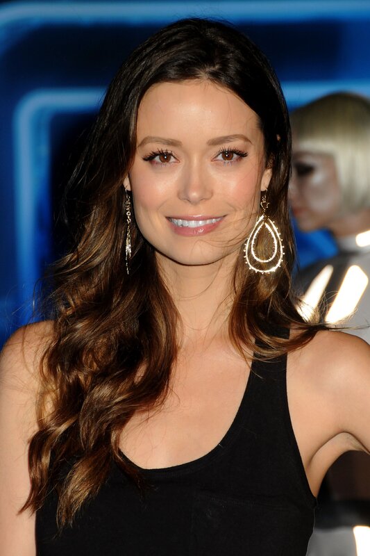 woman with long hair smiling