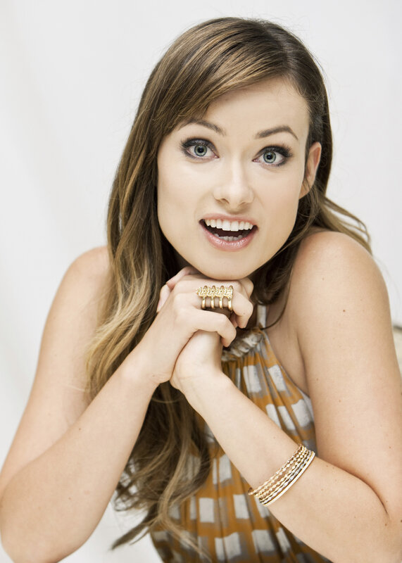 woman with long hair smiling