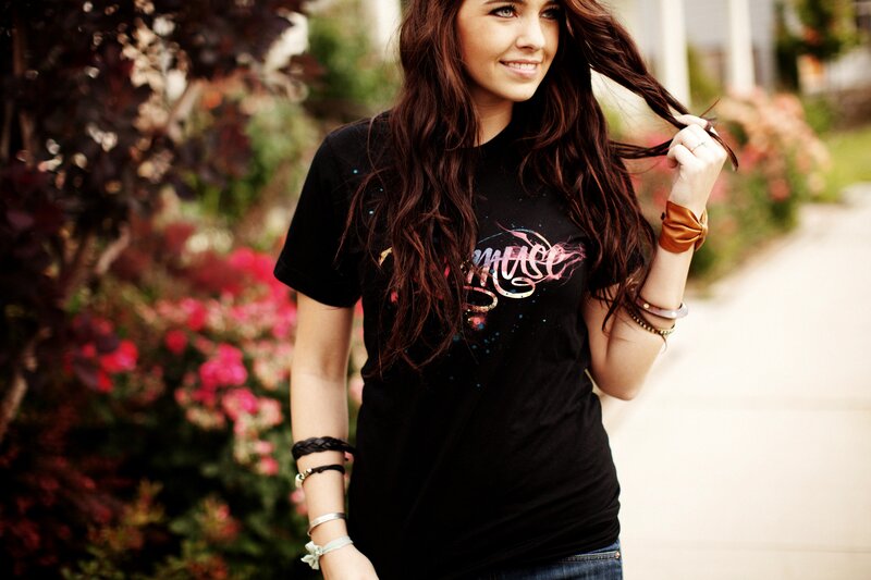 woman with long hair smiling