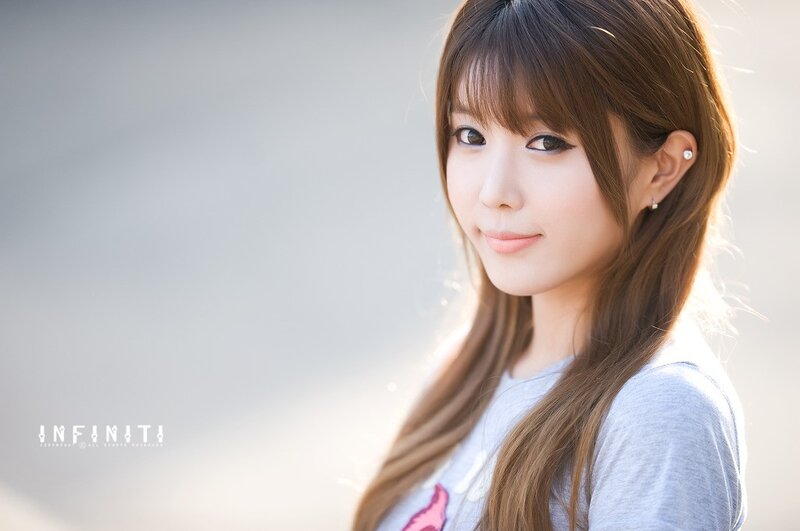 woman with long hair smiling