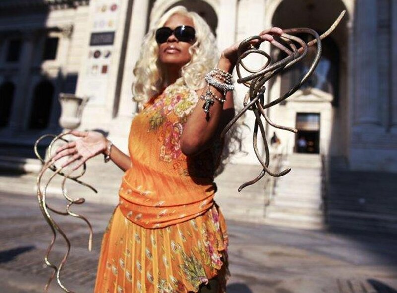 Woman with Long Nails — Orange