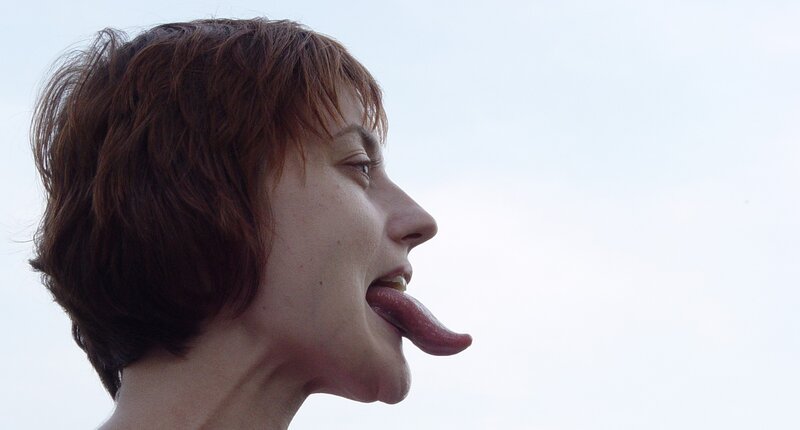 woman with long tongue