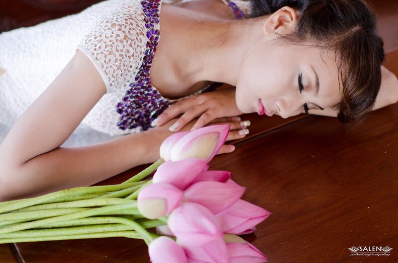 woman with lotus flowers