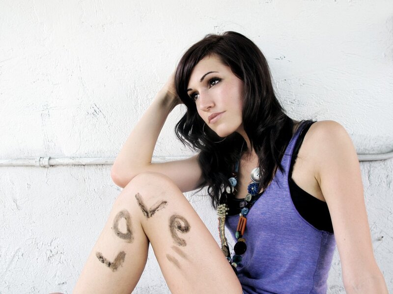 woman with love written on leg