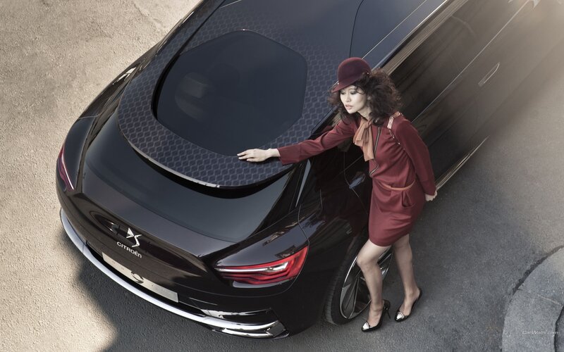 Woman with luxury car