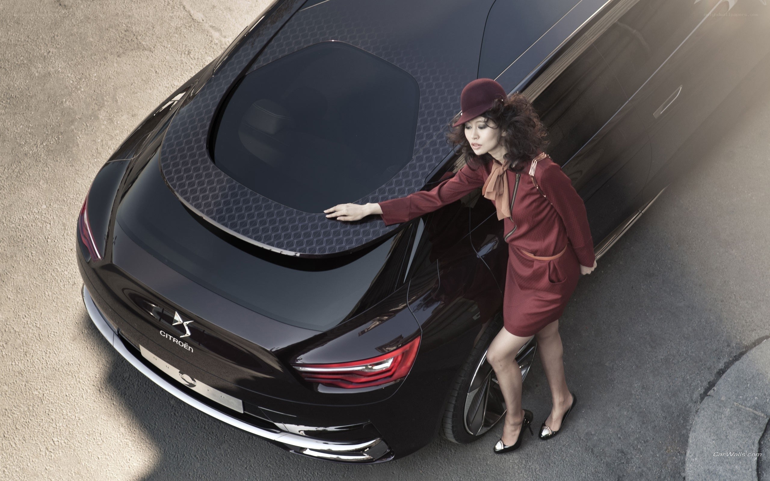 Woman with luxury car