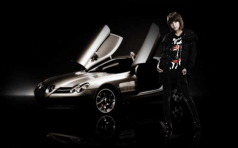woman with luxury car