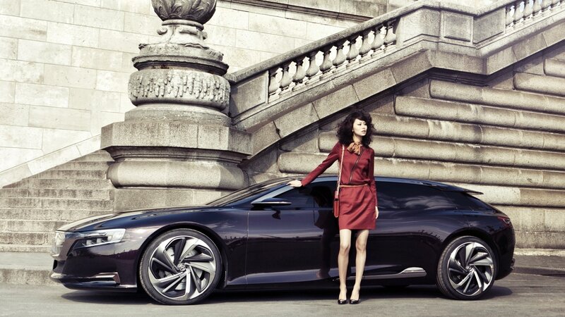 woman with luxury car