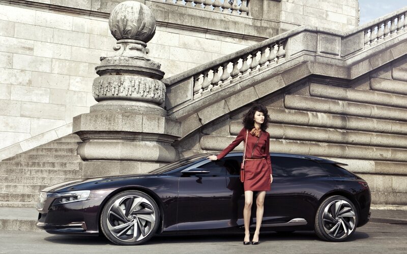 Woman with luxury car