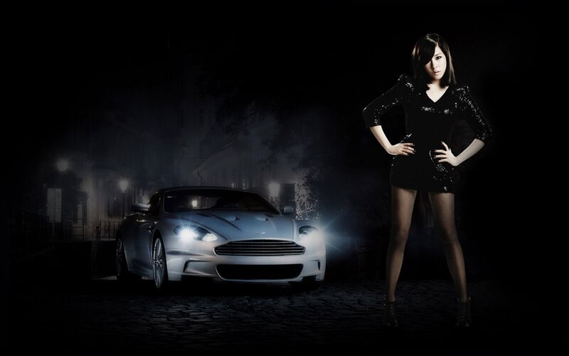 woman with luxury car at night