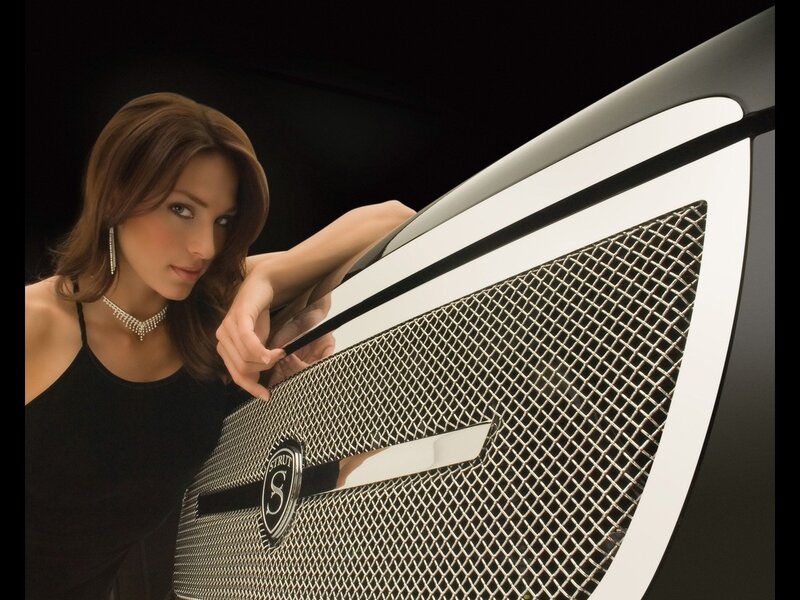 woman with luxury car grille