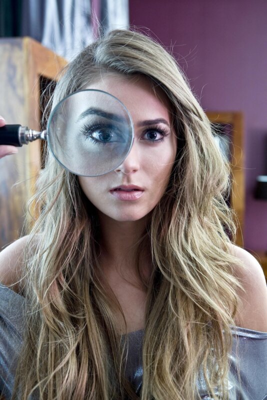 woman with magnifying glass