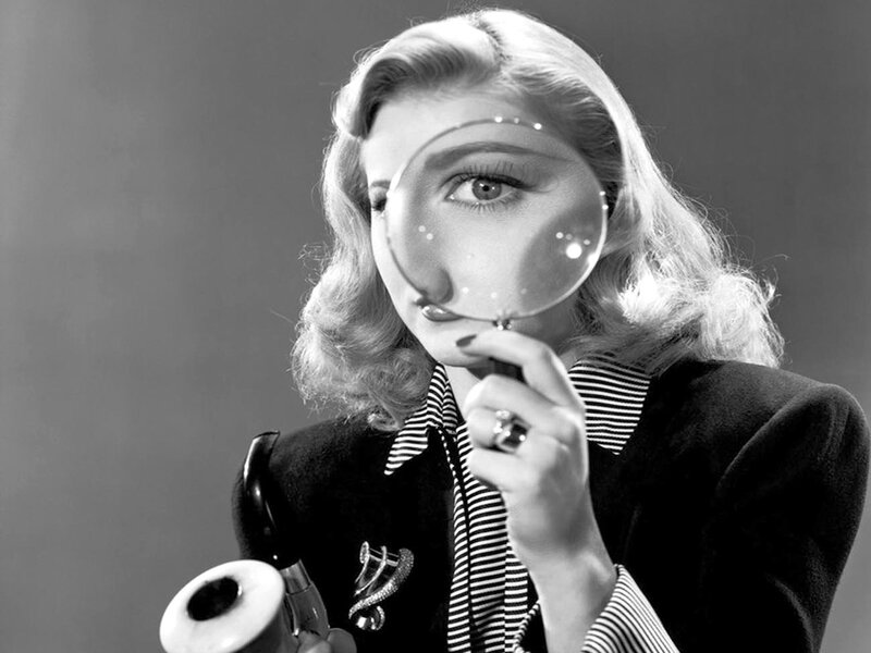 Woman with Magnifying Glass — Black, Dramatic