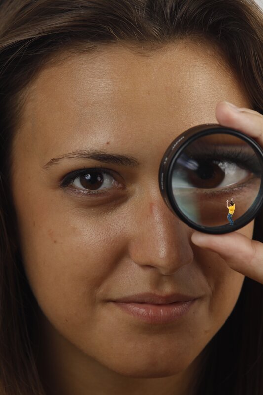 woman with magnifying glass