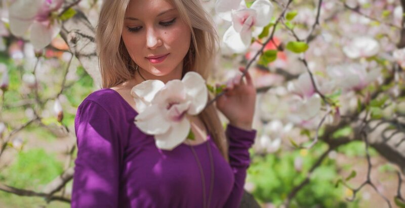 Woman with Magnolia Flower