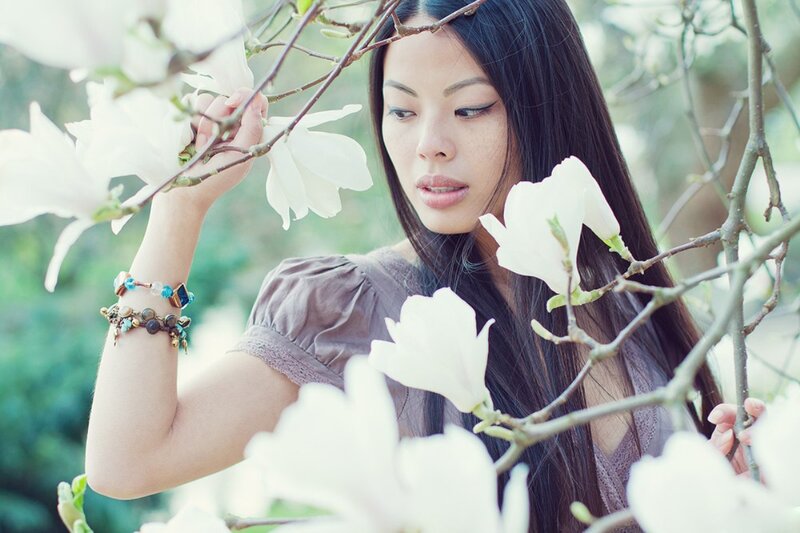 Woman with Magnolia Flowers — White