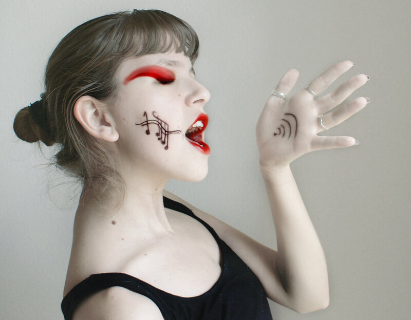 Woman with Makeup and Drawings
